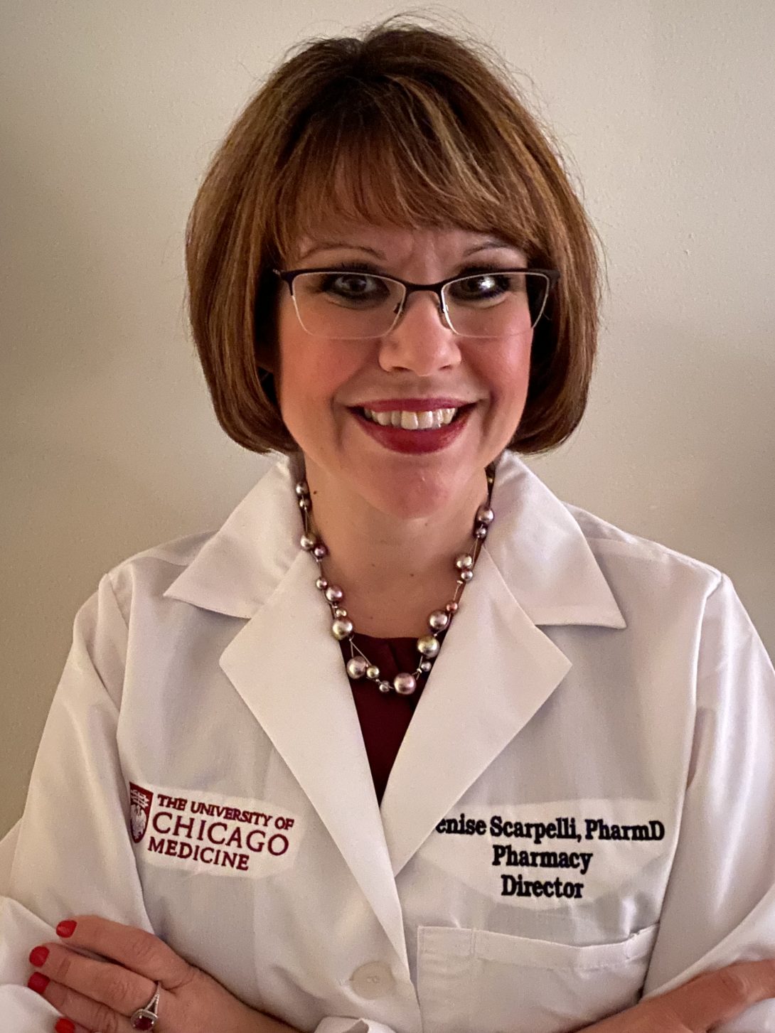 Dr. Denise Scarpelli's Biography